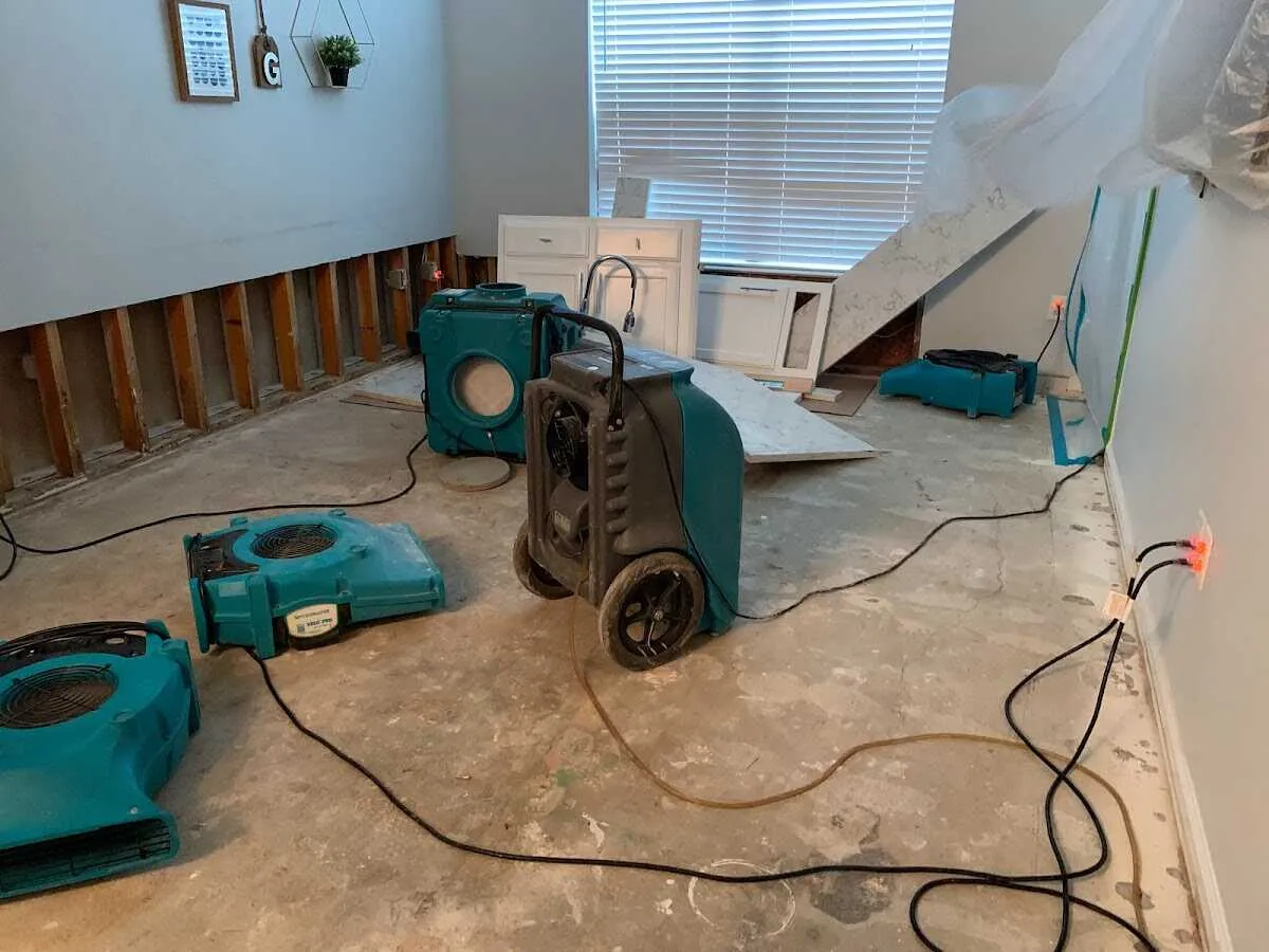 Dehumidifier in flood-cut room for Water Damage Restoration in Margaret